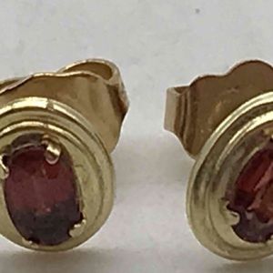 14k Yellow Gold Post 11k 3x5mm Garnet Oval Stud Earrings